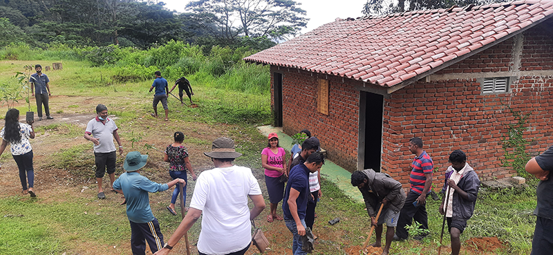 Shot of the site with the teams from up on an adjecent knoll 